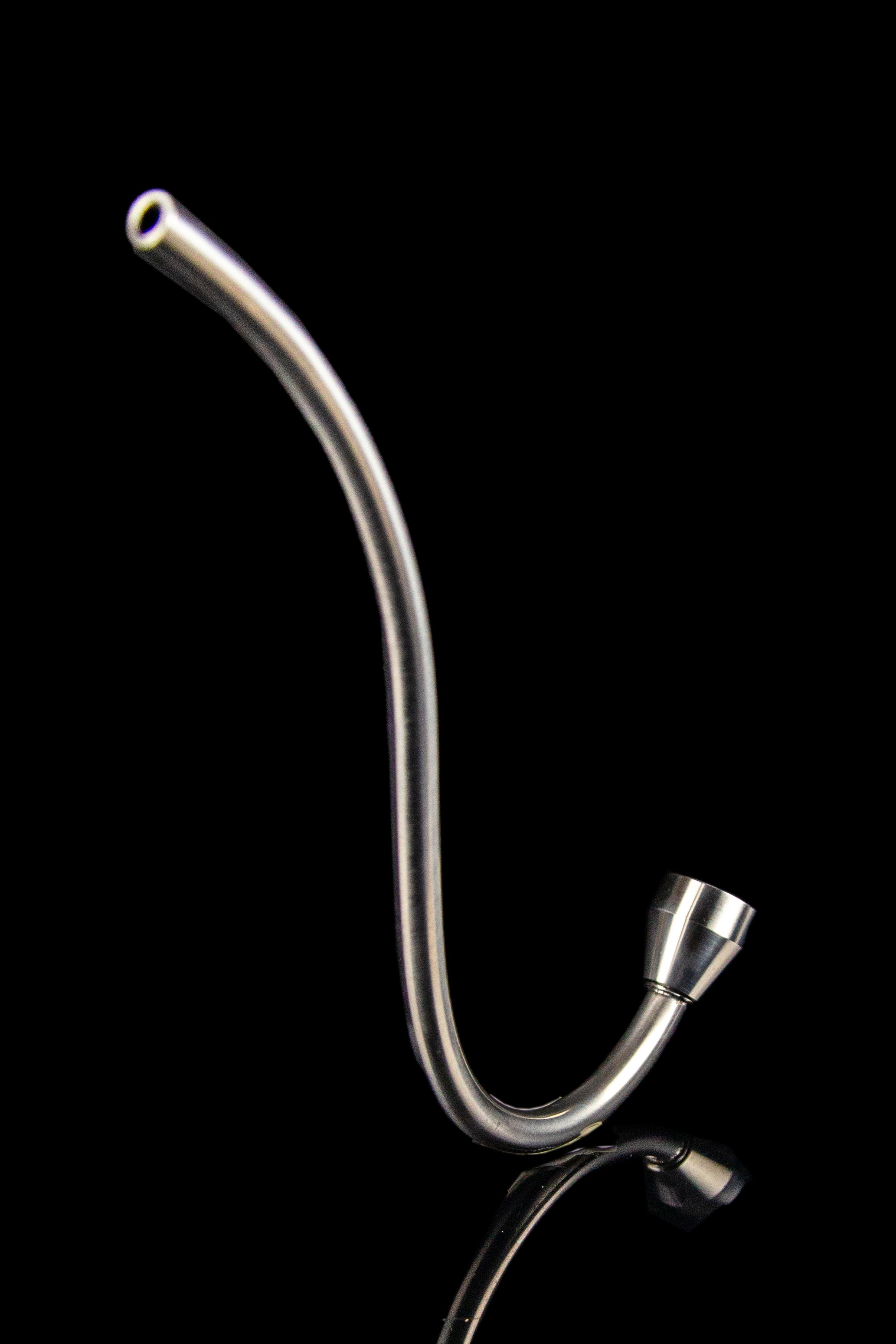 Silver cannabis oil rig downstem against a black background.