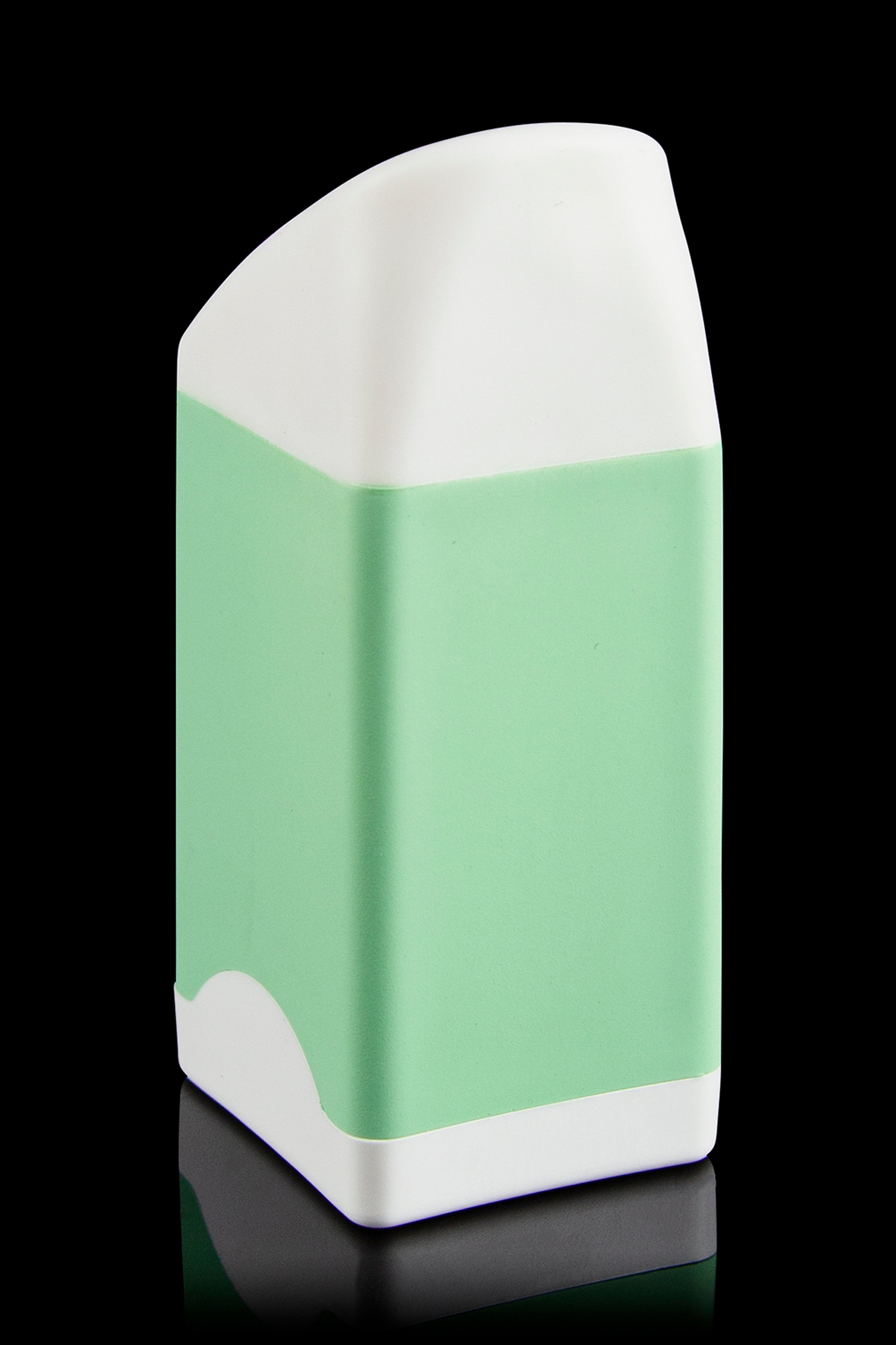 Sleek, mint green cannabis pre-roll container with white accents, reflecting on a glossy surface.