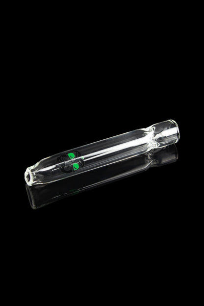 Clear glass bubbler pipe with green accents, isolated on a black background.