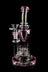 Pink glass water pipe (bong) with intricate percolator and bowl piece against a black background. - Calibear "Sundae Stack" Torus Recycler Water Pipe