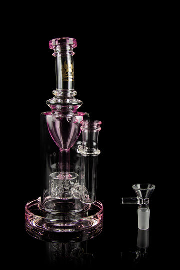 Pink glass water pipe (bong) and separate glass bowl displayed on a black reflective surface. - Calibear "Sundae Stack" Torus Recycler Water Pipe