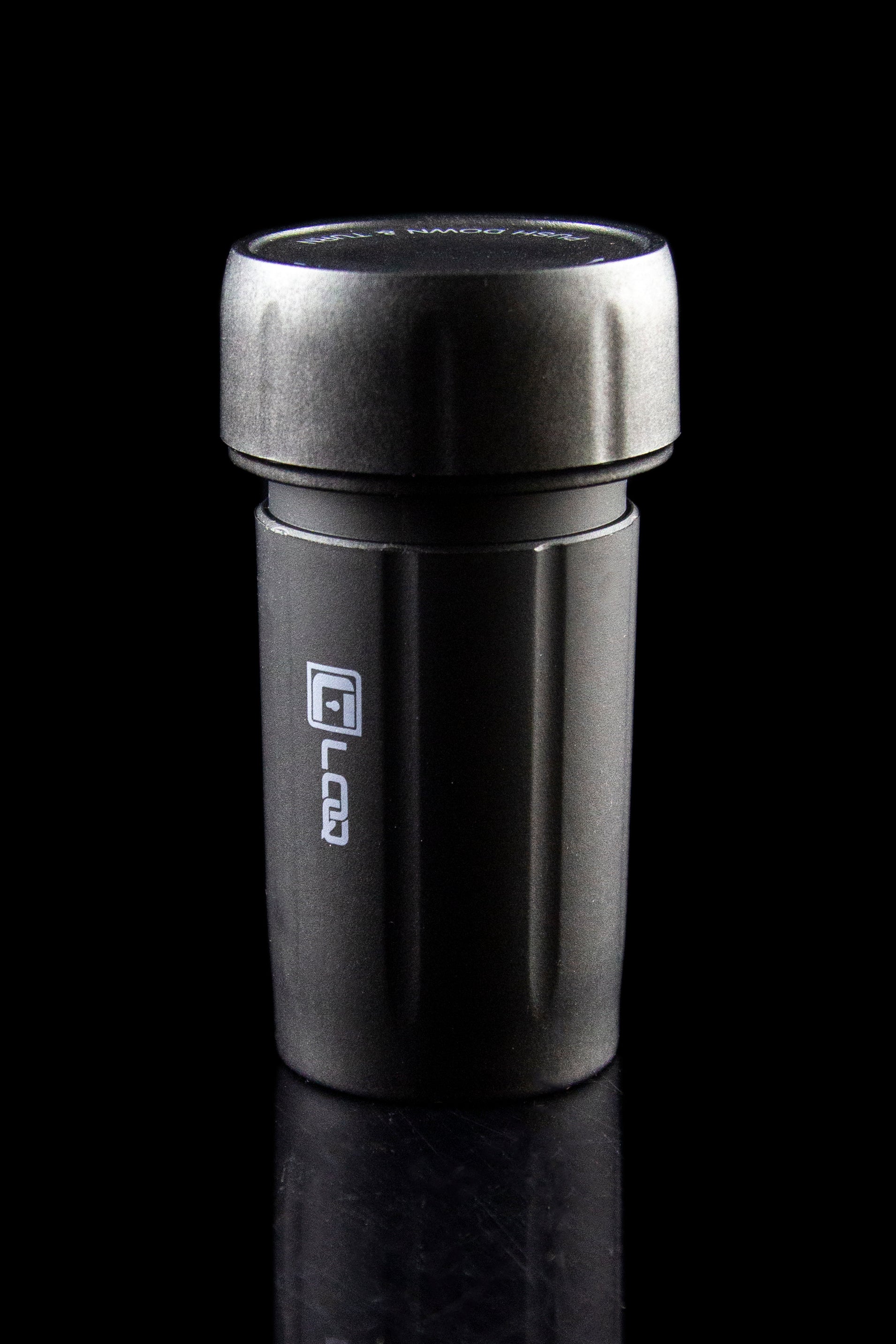 Sleek, black cannabis oil vape cartridge with branding.