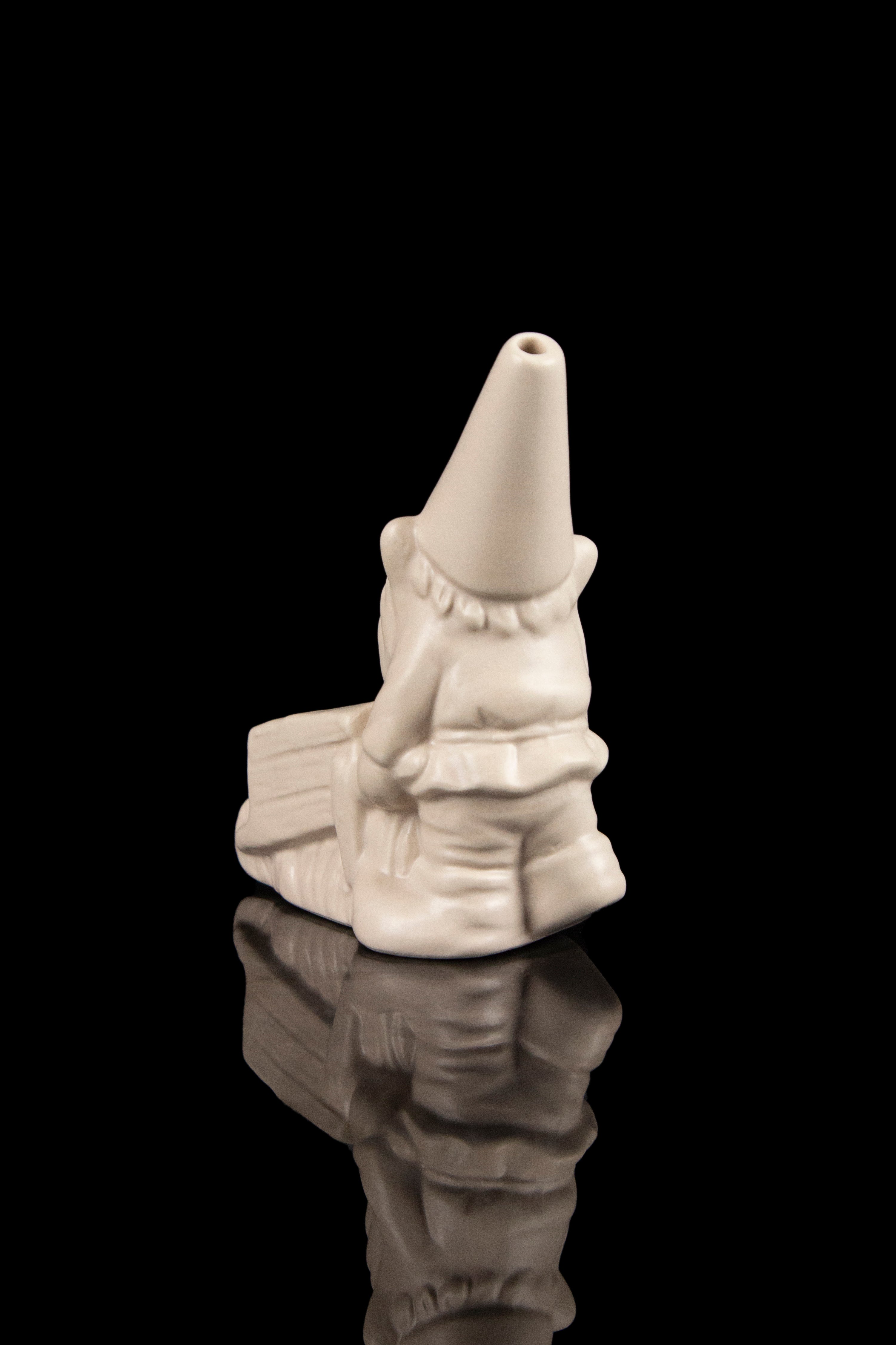Ceramic wizard-shaped water pipe with a glossy reflective base.