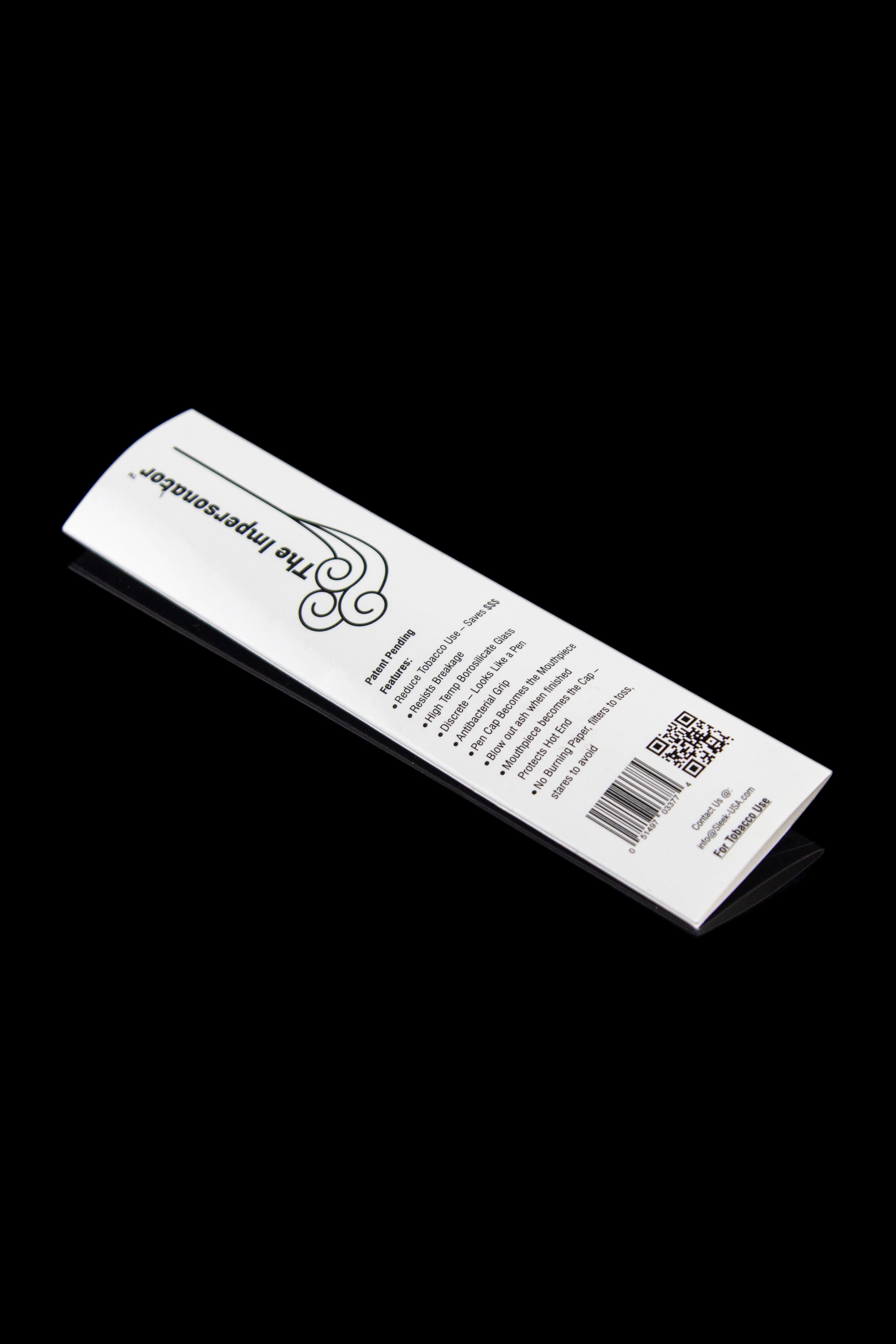 White cardboard packaging for “The Impeccable” smoking accessory with text detailing features and a QR code.