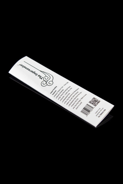 White cardboard packaging for “The Impeccable” smoking accessory with text detailing features and a QR code.