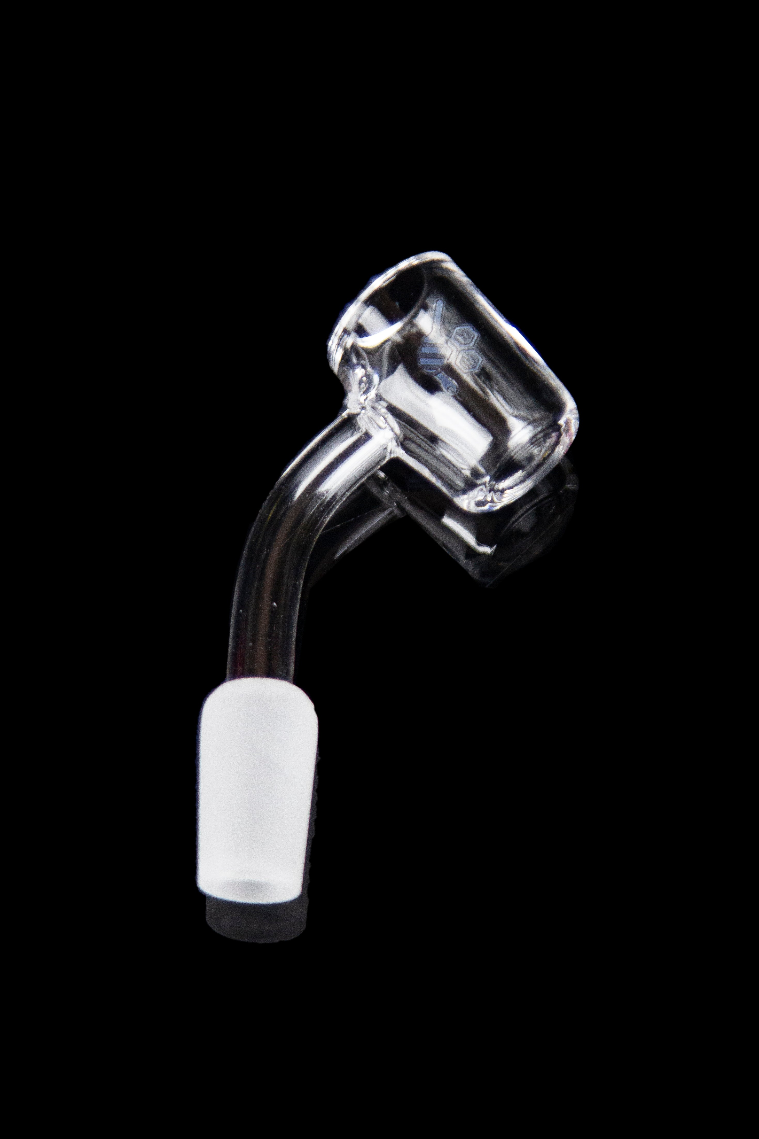 Clear quartz dab rig nail with a frosted joint, isolated on a black background.
