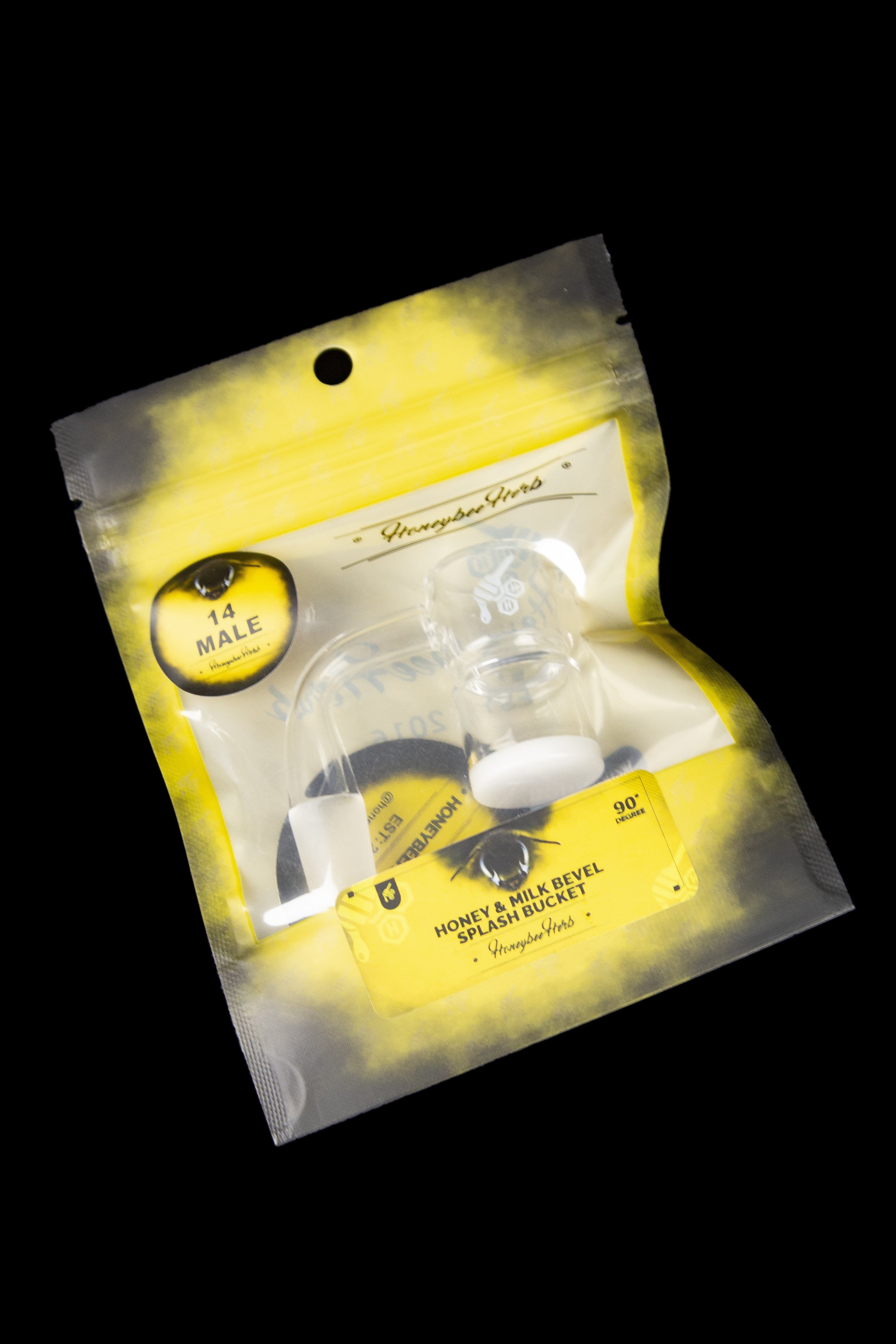 A sealed, yellow and black foil bag for “Honey & Milk Splash Bucket” cannabis accessory. The bag features a cartoon bee wearing sunglasses and the text "Honeybee Hive".