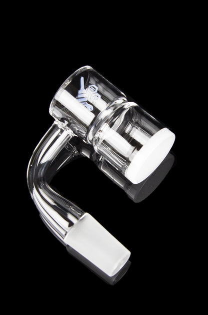 Clear glass dab rig with intricate design, isolated on a black background.