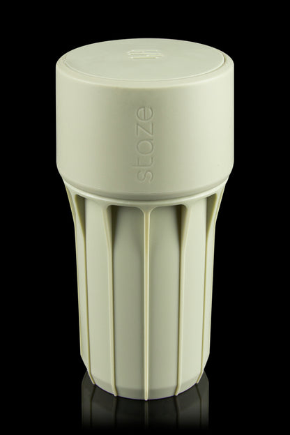Olive green Stoze cannabis container with a textured grip and airtight lid.