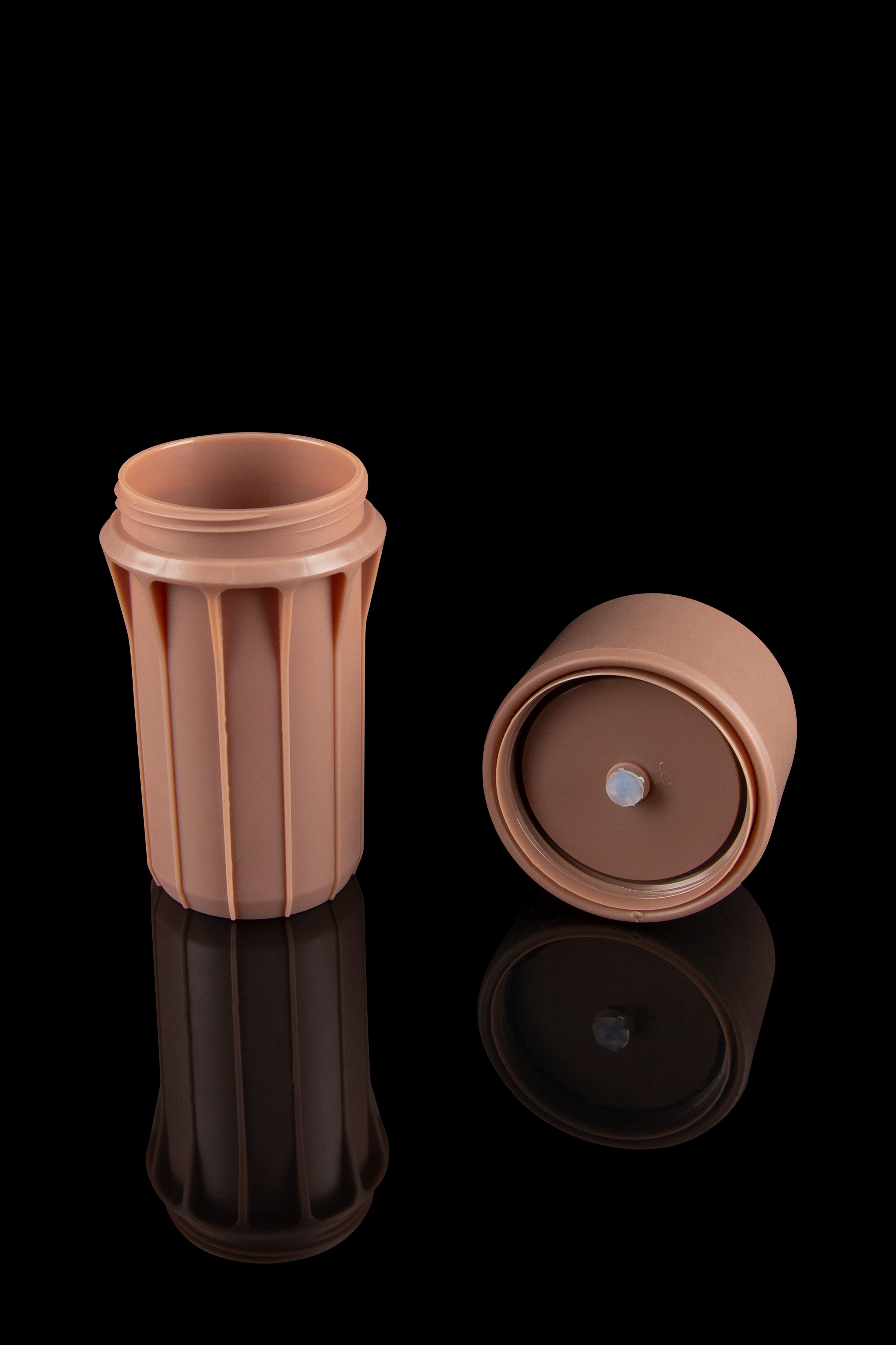 Open and closed terracotta-colored cannabis storage container with reflective surface.