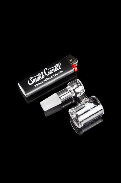 Clear glass dab rig with a branded box.