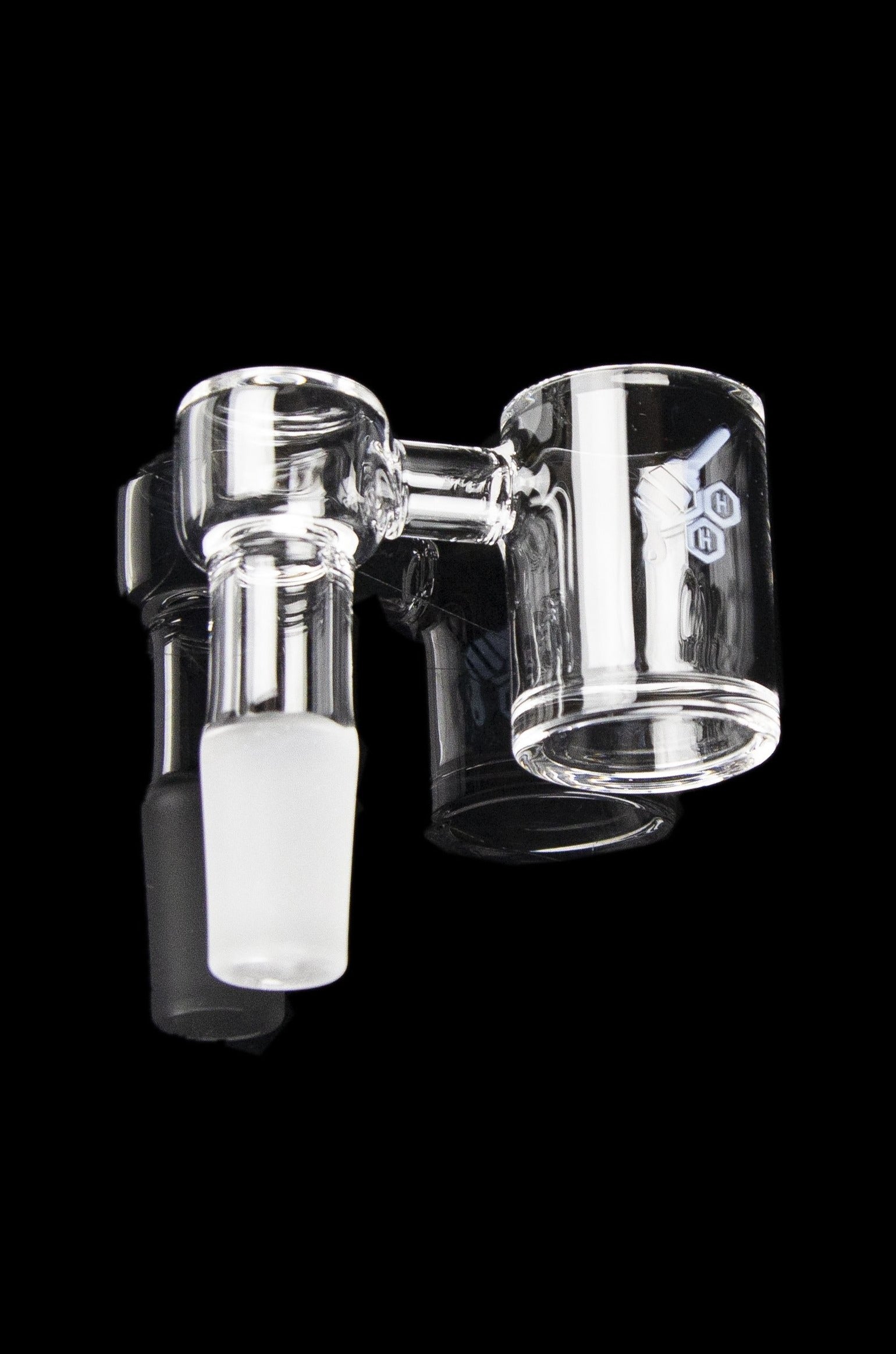 Clear glass bubbler for smoking cannabis, isolated on a black background.