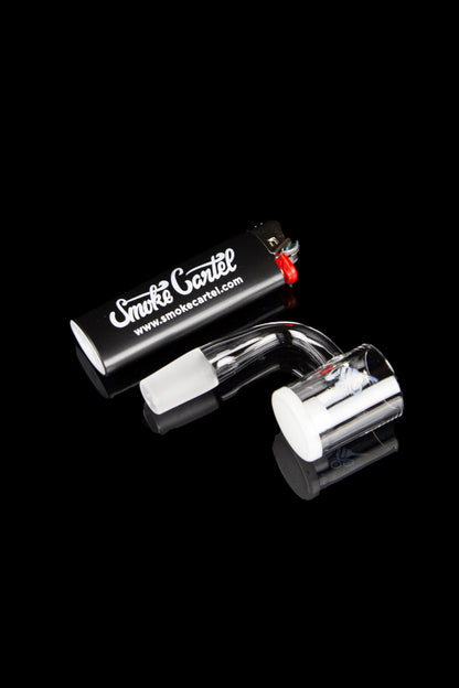 Black cannabis bubbler with clear glass chamber, branded with "Smoke Cartel."