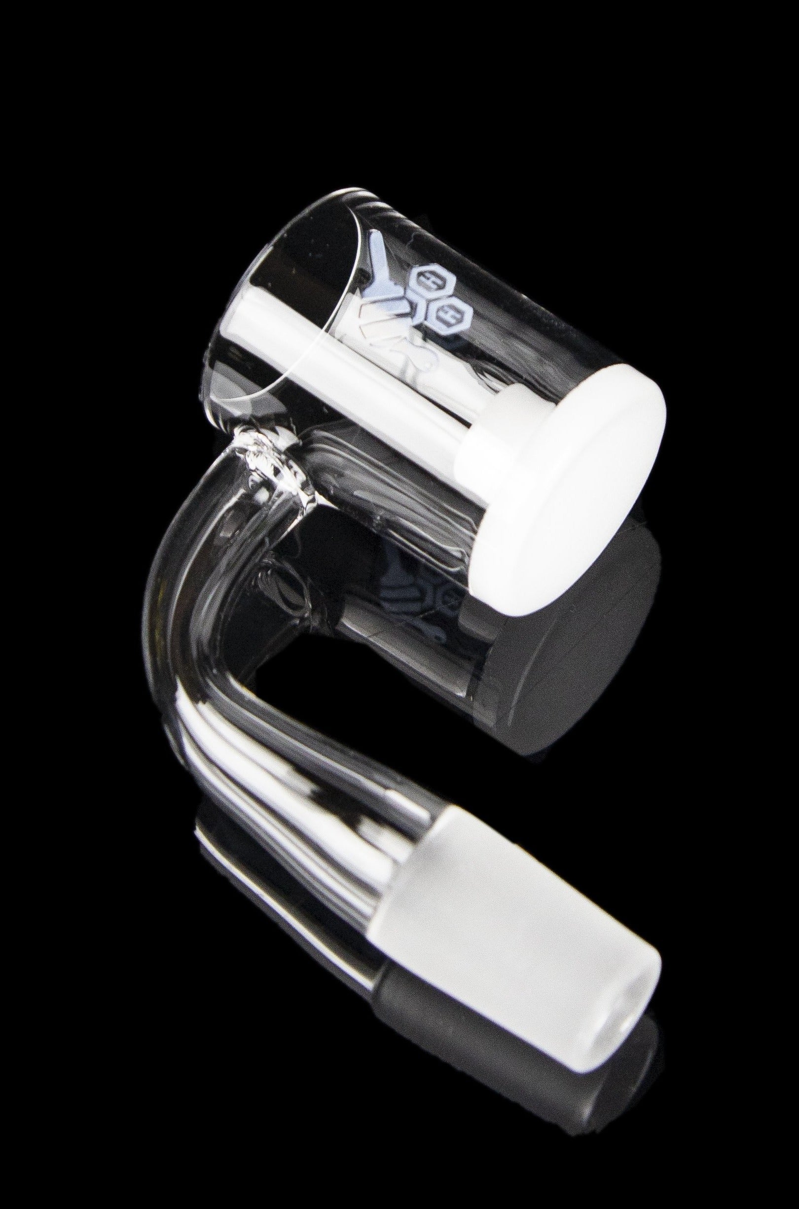 Clear glass dab rig with black accents, isolated on a black background.