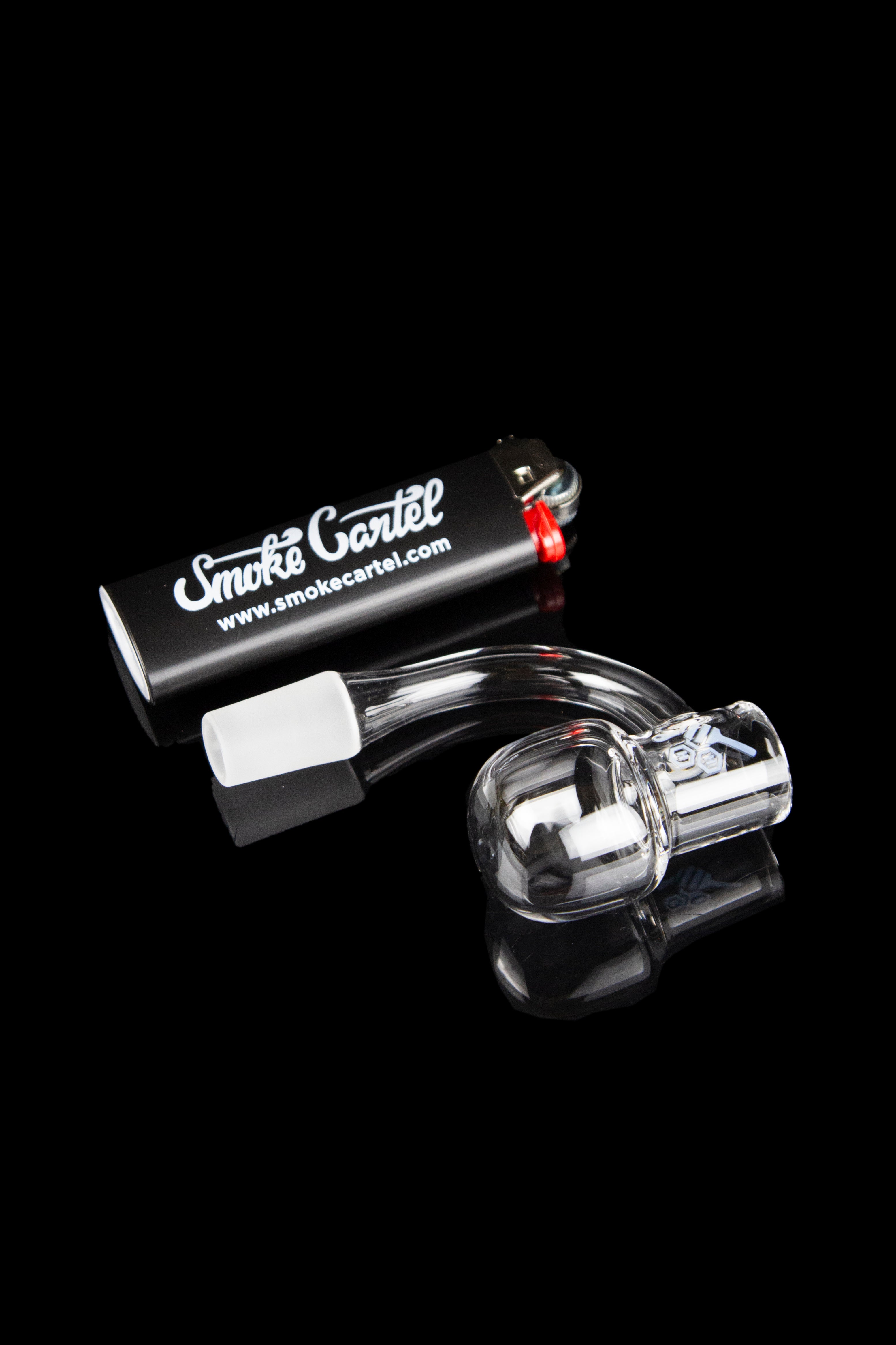 Glass dab rig with quartz banger and carb cap, branded with “Smoke Cartel” logo, against a black background.