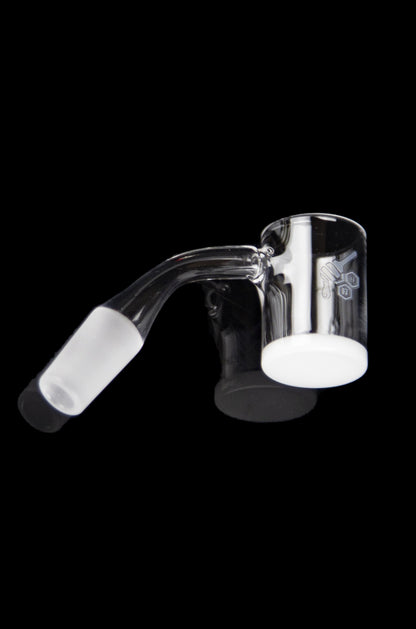 Clear glass dab rig with a bent neck and white interior.