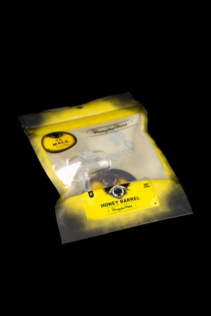 A sealed, yellow and black mylar bag labeled "Honey Barrel" with cannabis imagery.