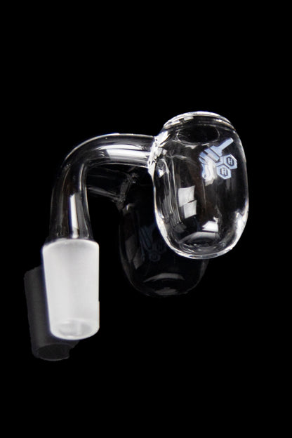 Clear quartz dab rig nail with ceramic insert against a black background.