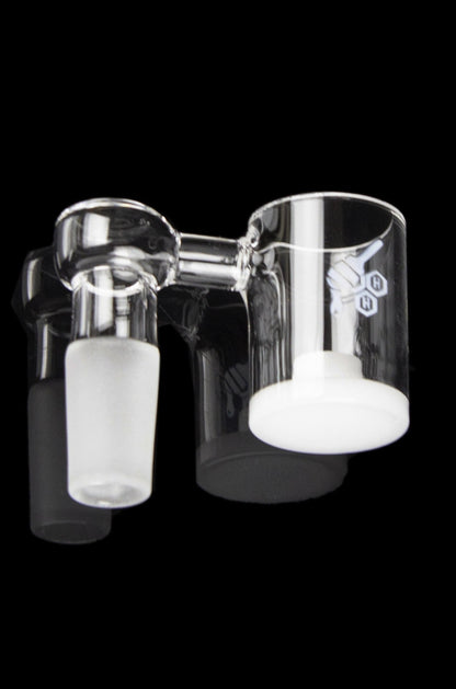 Clear glass dab rig inserts with white ceramic bowls, isolated on a black background.