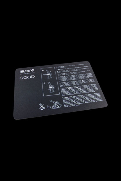 Close-up of a Daab cannabis oil vaporizer instruction manual with diagrams and text on a black background.