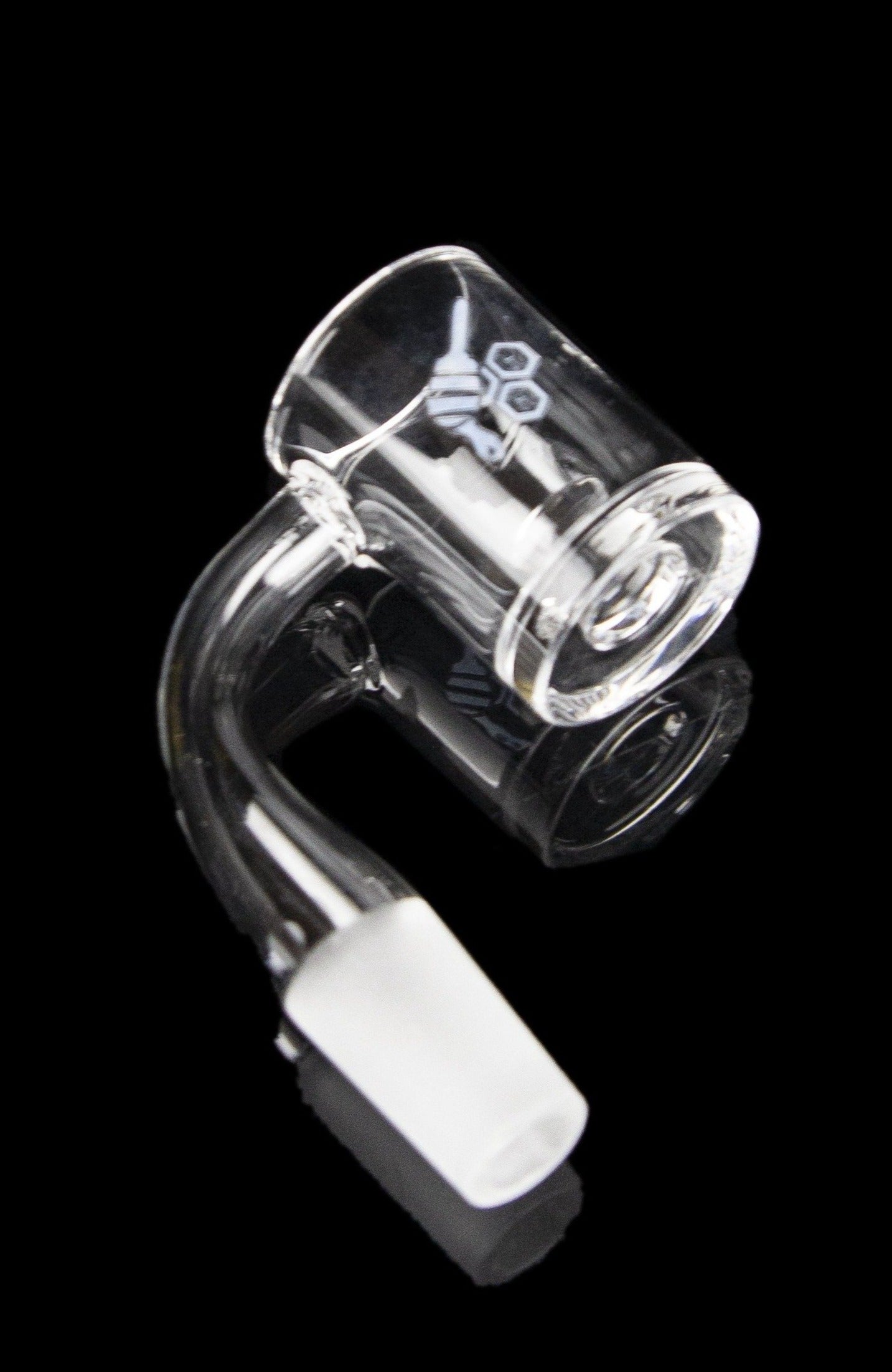 Clear quartz banger with a white and black handle, used for vaporizing cannabis concentrates.