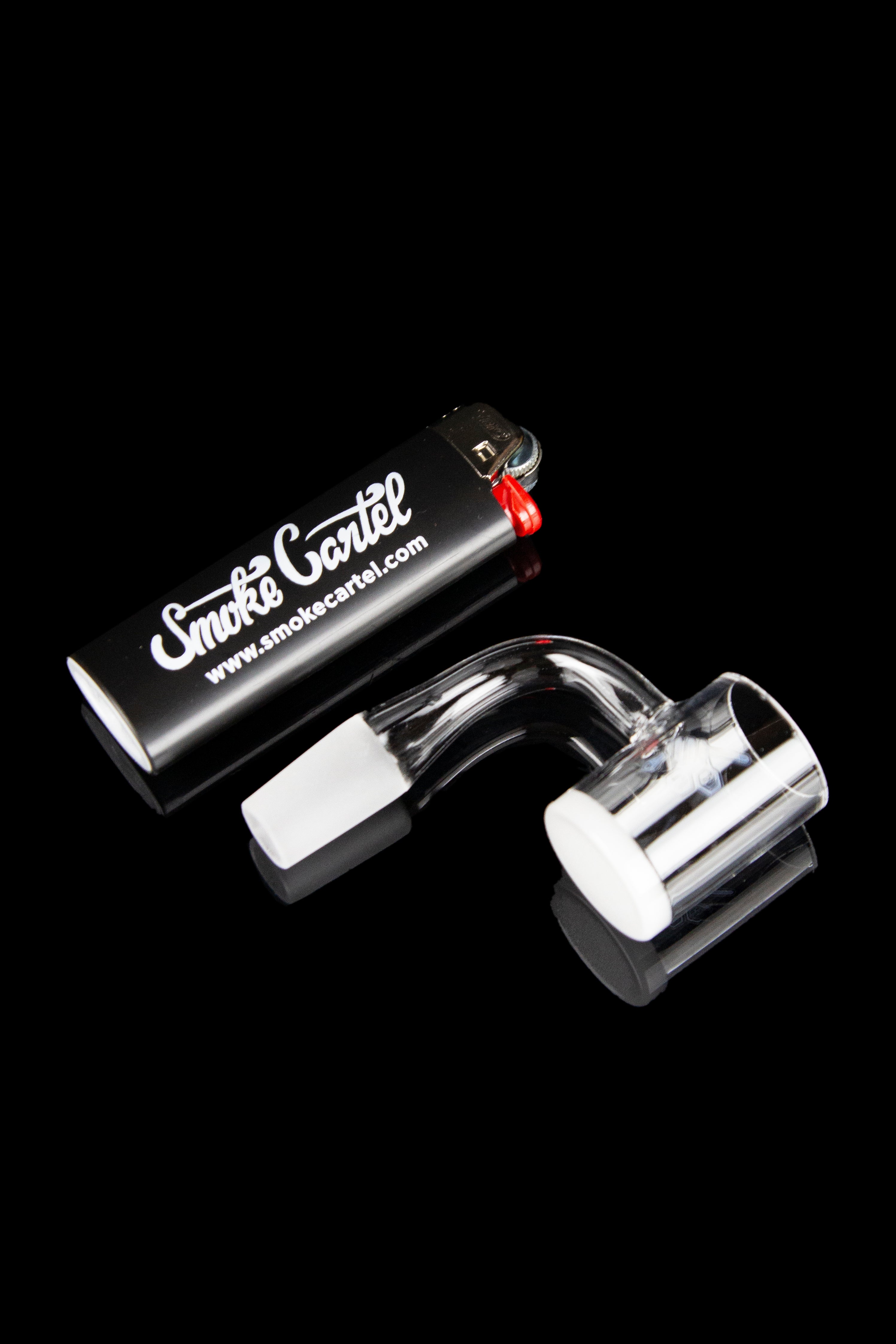 Quartz banger and carb cap for dabbing cannabis concentrates, branded “Smoke Cartel.”