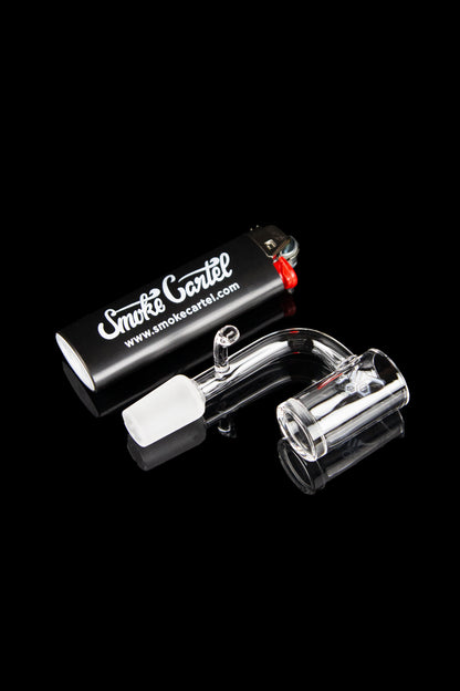 Glass bubbler and accessories with Smoke Cartel branding on a black background.