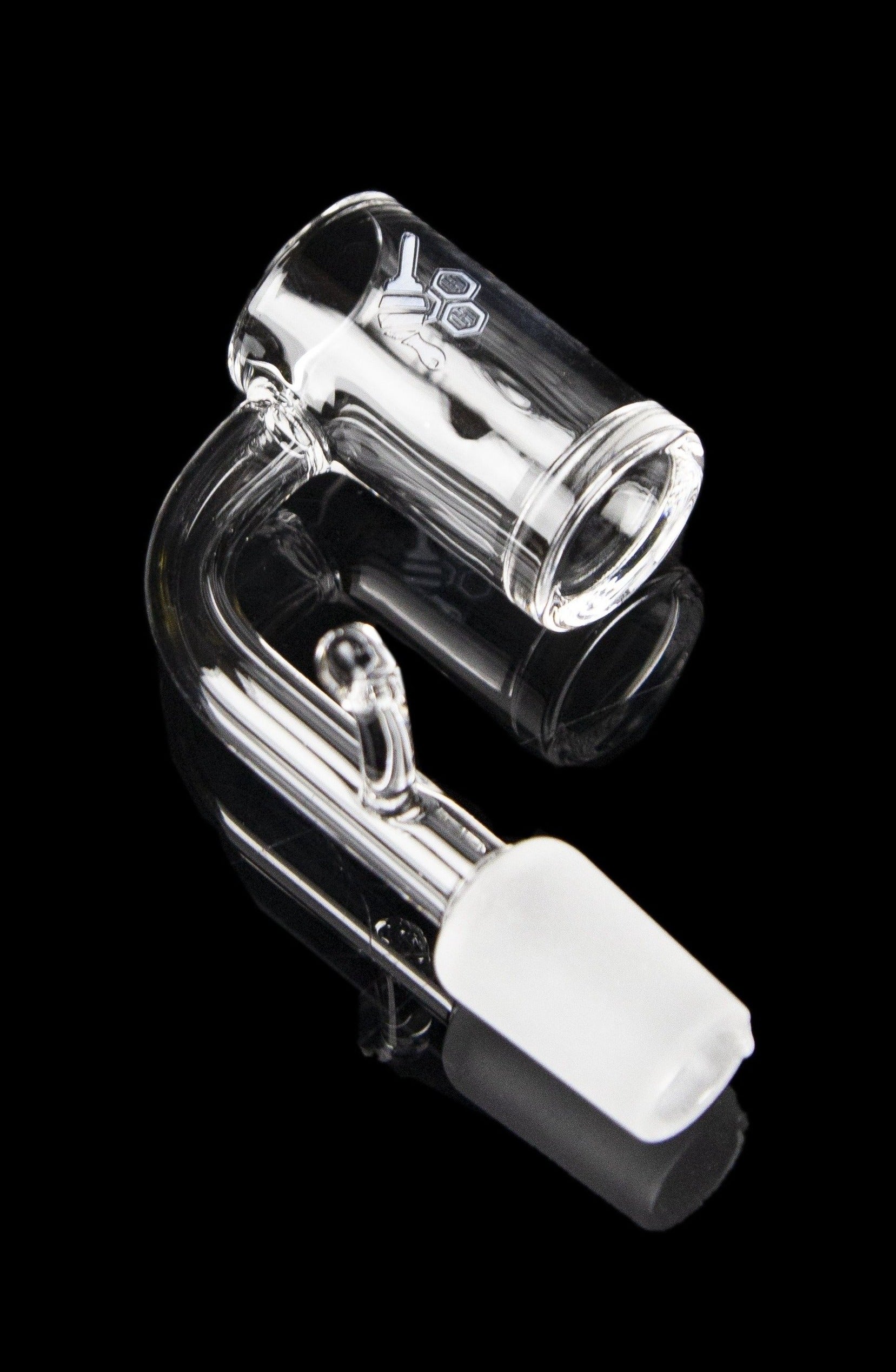 Clear glass dab rig with a quartz insert, isolated on a black background.