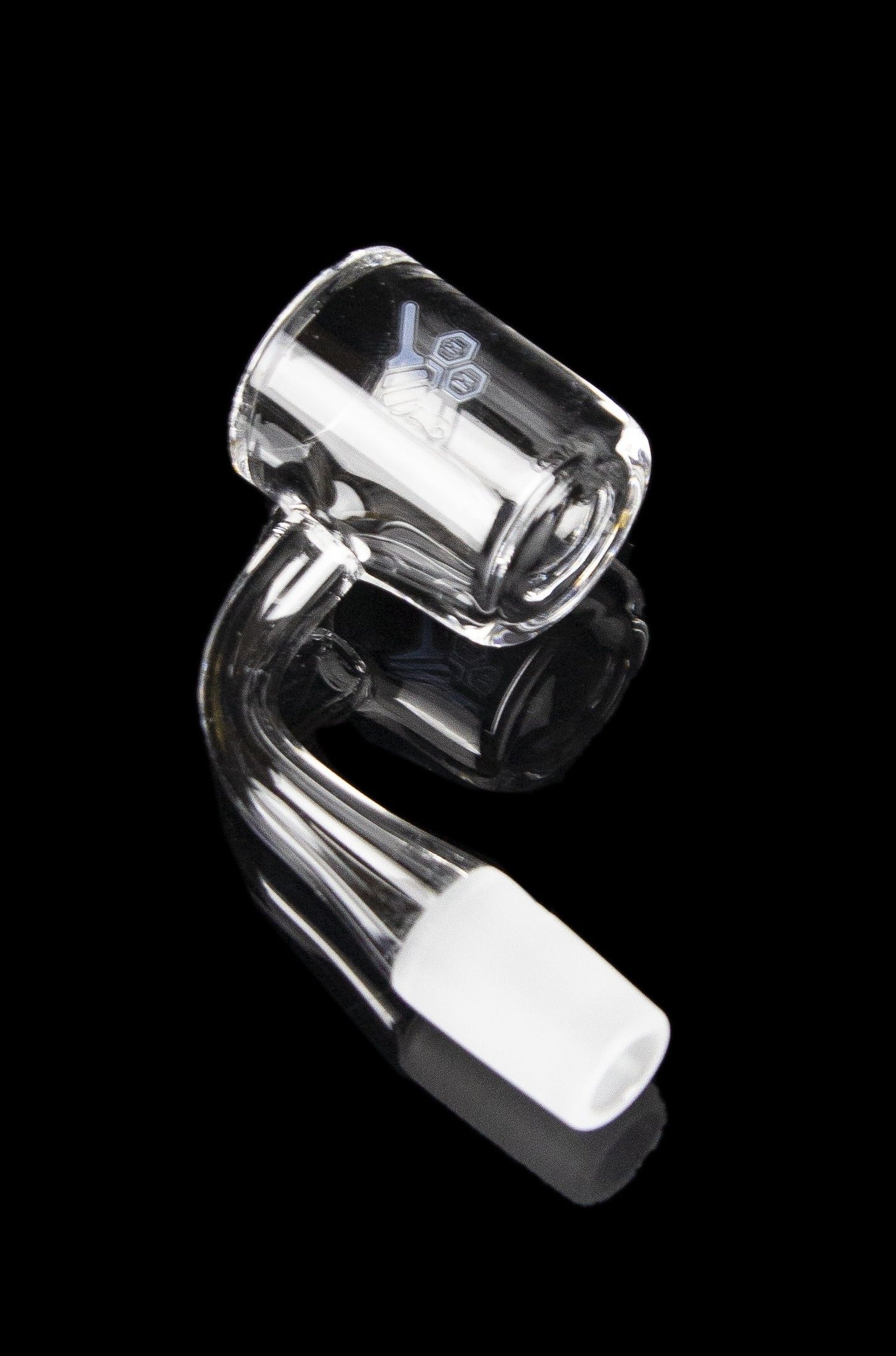 Clear glass cannabis dab rig concentrate bowl against a black background.