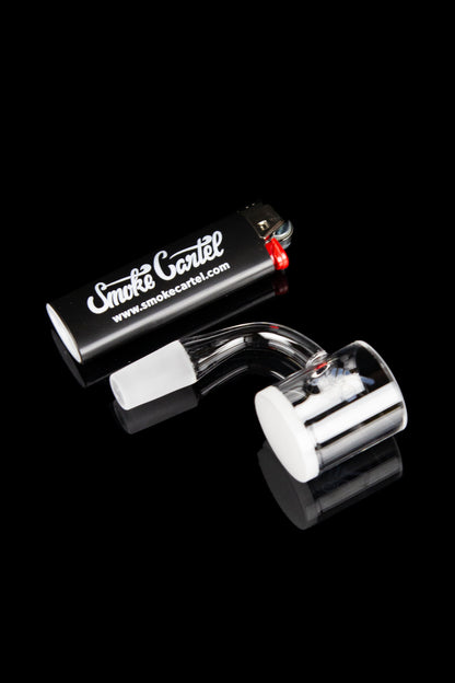 Glass bubbler with black accents and “Smoke Cartel” logo against a black background.