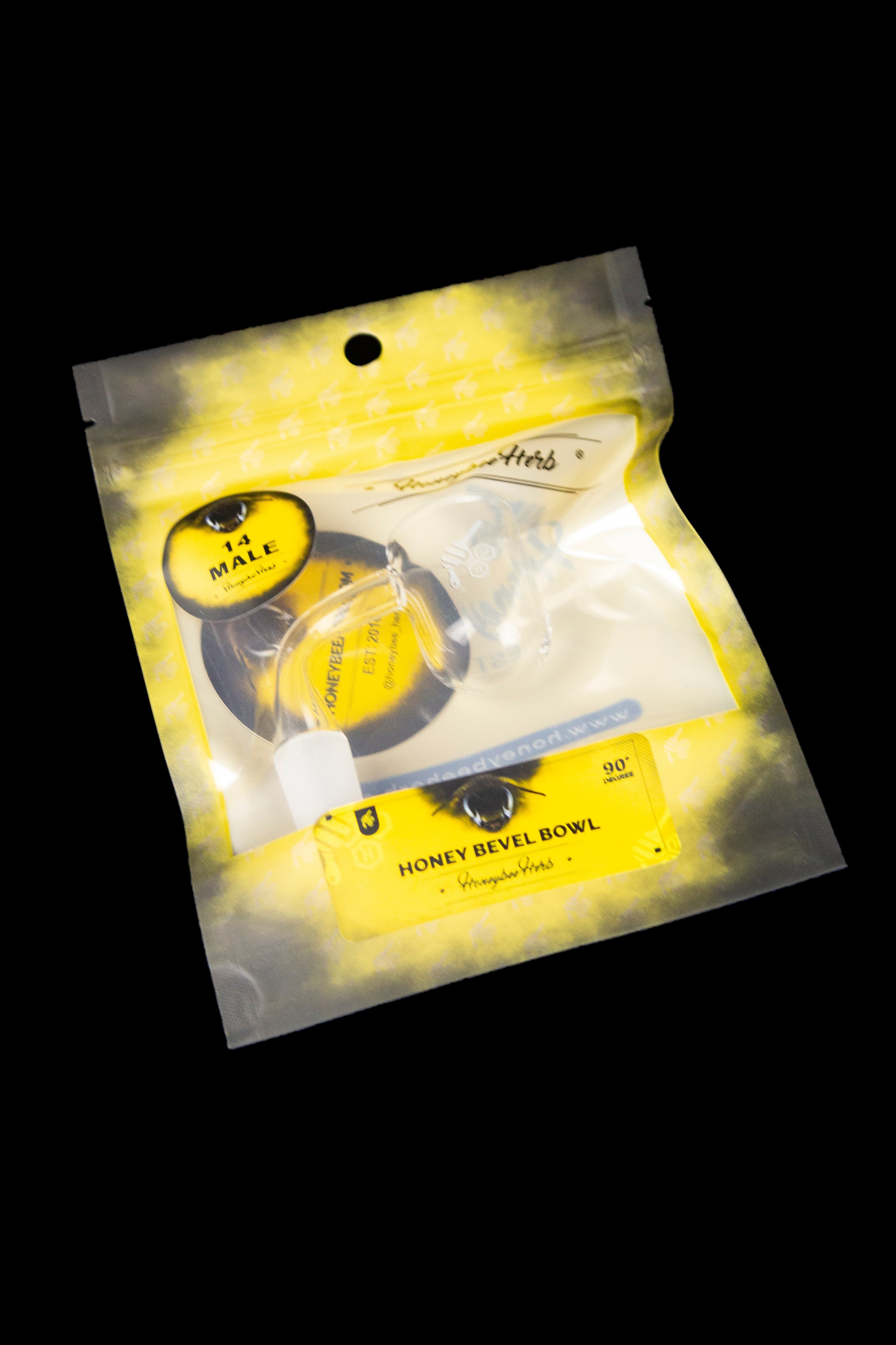Yellow packaging for a “Honey Bevel Bowl” cannabis accessory with branding details.