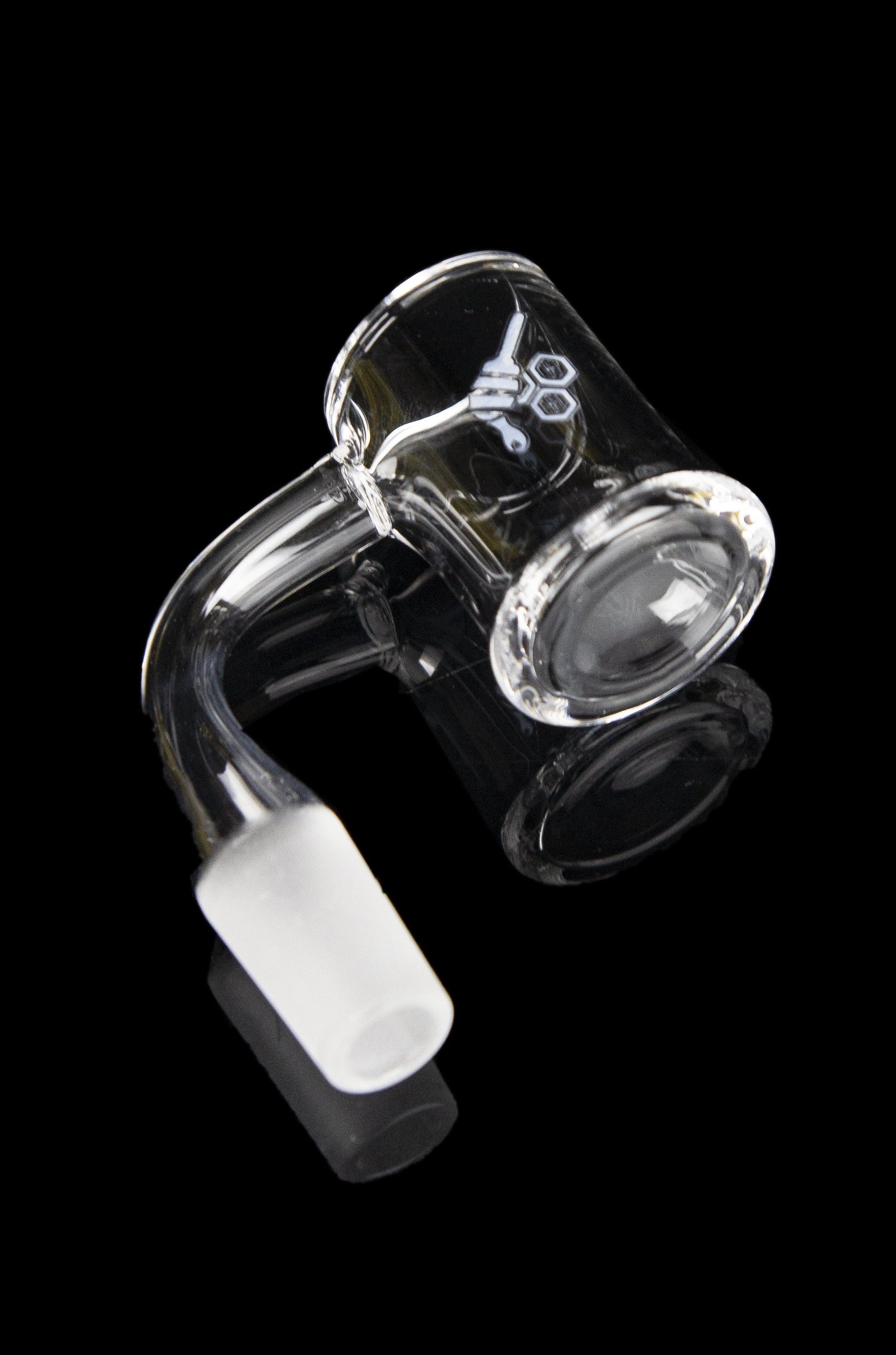 Clear glass dab rig with a bent neck and white mouthpiece against a black background.