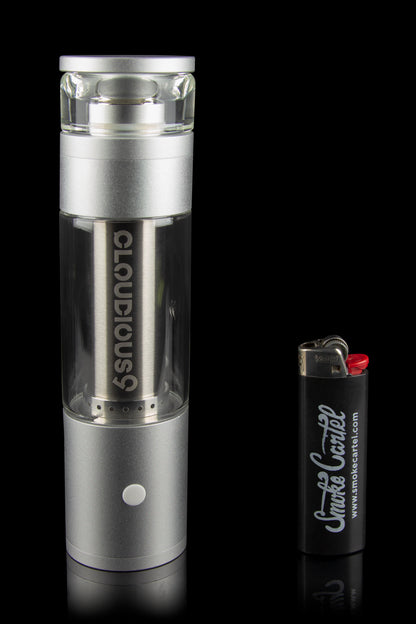 Silver Cloudious9 vaporizer pen and lighter on a reflective surface.