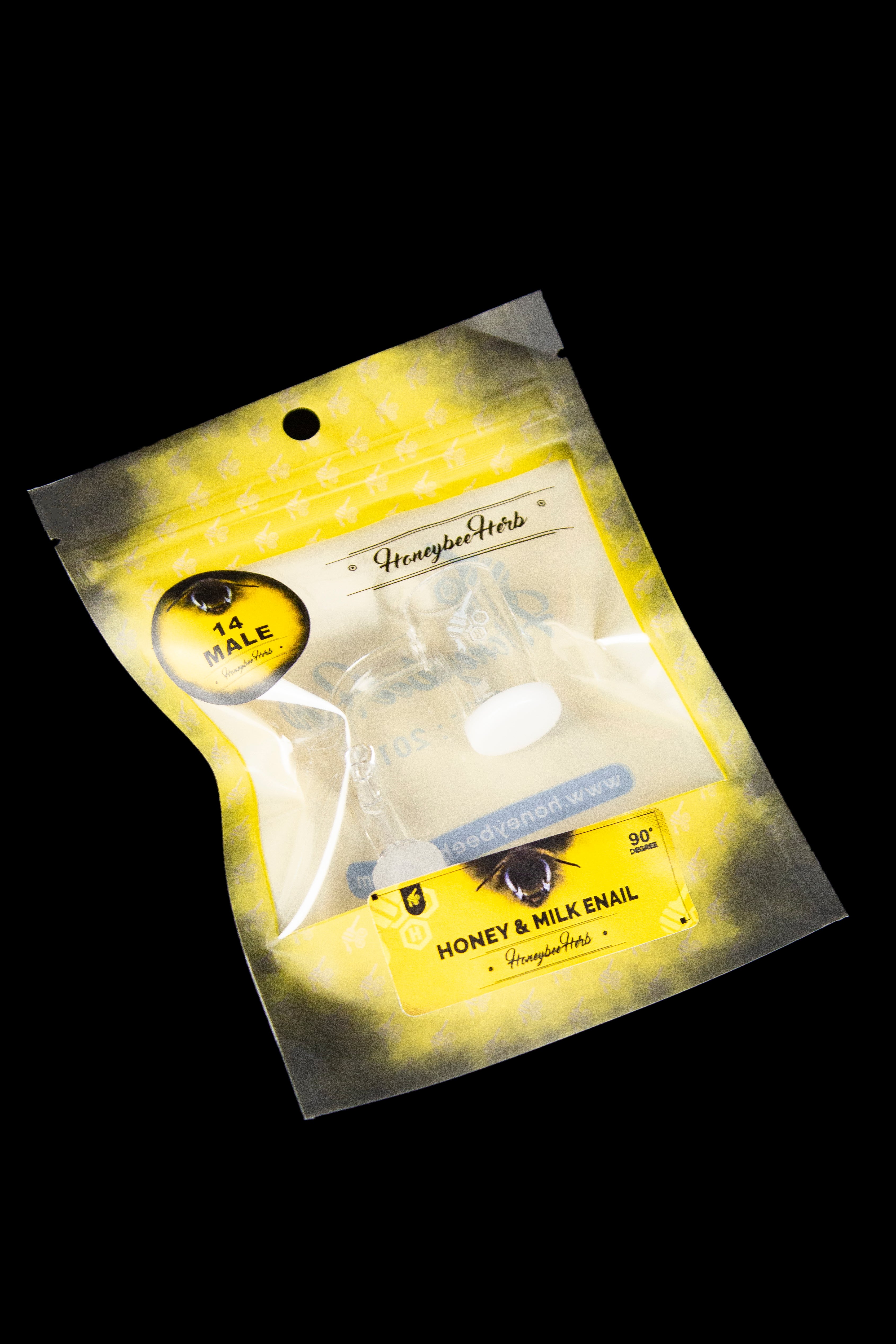 Yellow bag of Honeybee Herbs “Honey & Milk” enail, featuring a cannabis concentrate container and branding.
