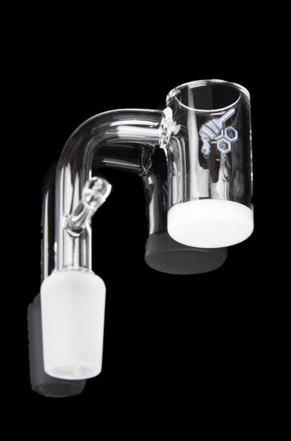 Clear glass dab rig with intricate detailing.