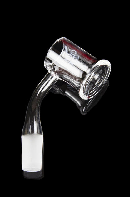 Clear glass dab rig with red accent and angled neck, isolated on a black background.