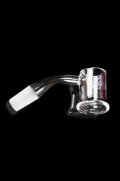 Clear glass dab rig with red and white accents, isolated on a black background.