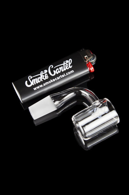 Clear glass dab rig with branded packaging.