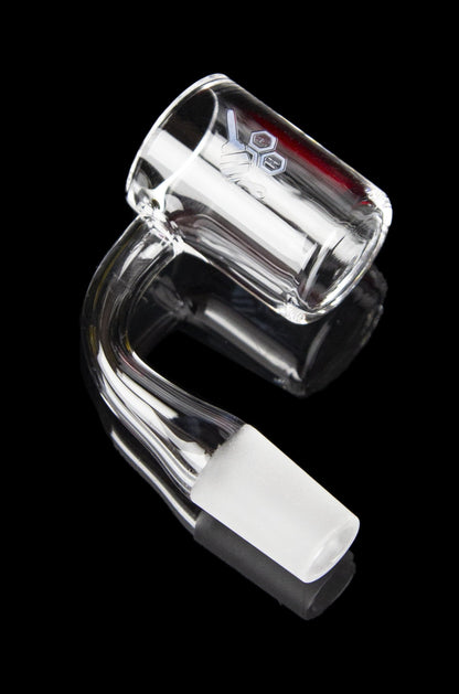 Clear glass dab rig with a curved neck and flat base, isolated on a black background.