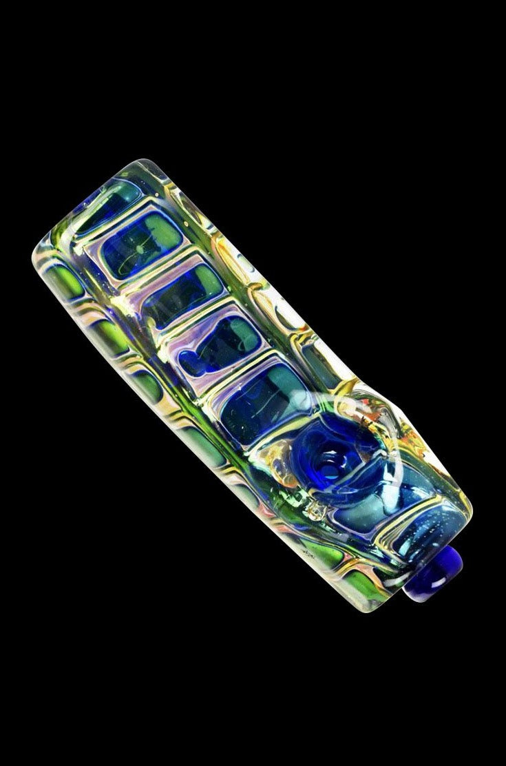 Squared Glass Hand Pipe displayed in a close-up shot, highlighting its simple glass construction and compact design.