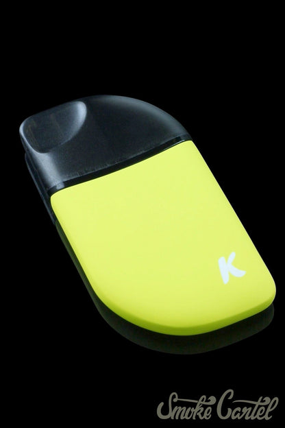 A sleek, angled view of the Kandy Pens Feather Compact Vaporizer, showcasing its smooth, minimalist design against a dark backdrop.