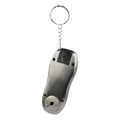 A close-up, angled view of the Stealth “Car Key Fob” Secret Hand Pipe, showing its black, key-fob-like design.