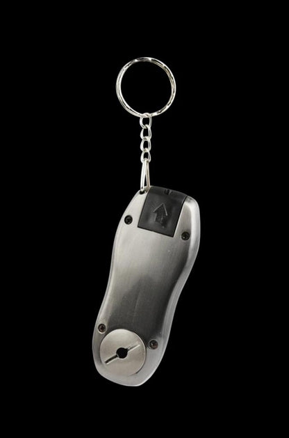 Front view of the "Stealth Car Key Fob" Secret Hand Pipe, resembling a car key with a metallic finish and a small loop attached.