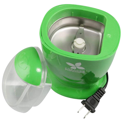 A slightly angled view of the Large Electric Grinder & Shredder with a partially open clear lid and black wall plug.