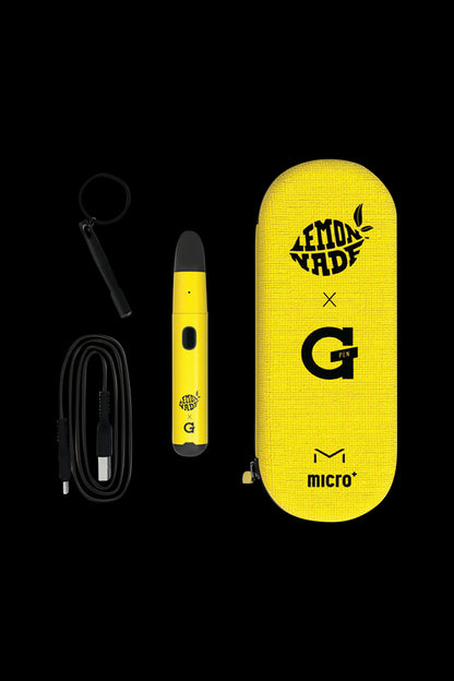 Front view of the Lemonnade x G Pen Micro+ Concentrate Vaporizer with a charging cable laid beside it on a black surface.