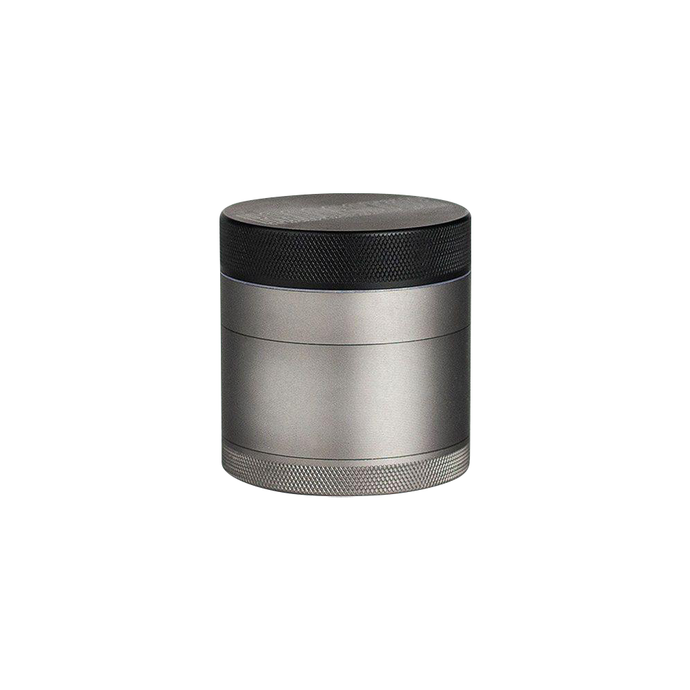 Front view of the Kannastor 4-Piece Solid Body Grinder, a cylindrical metal grinder with a textured top.
