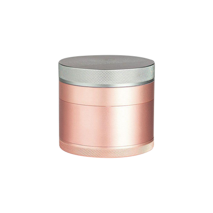 A close-up studio shot of the Kannastor 4-Piece Solid Body Grinder, showcasing its metallic finish and compact, cylindrical form.