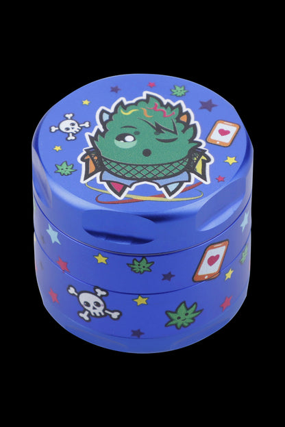 Blue grinder with cartoon cannabis-themed graphics including a marijuana bud pirate and cannabis leaves.
