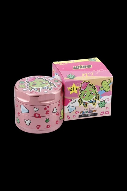 Pink grinder and box featuring a cartoon dinosaur and cannabis leaves, labeled “Wido” and “Pink Kush.”