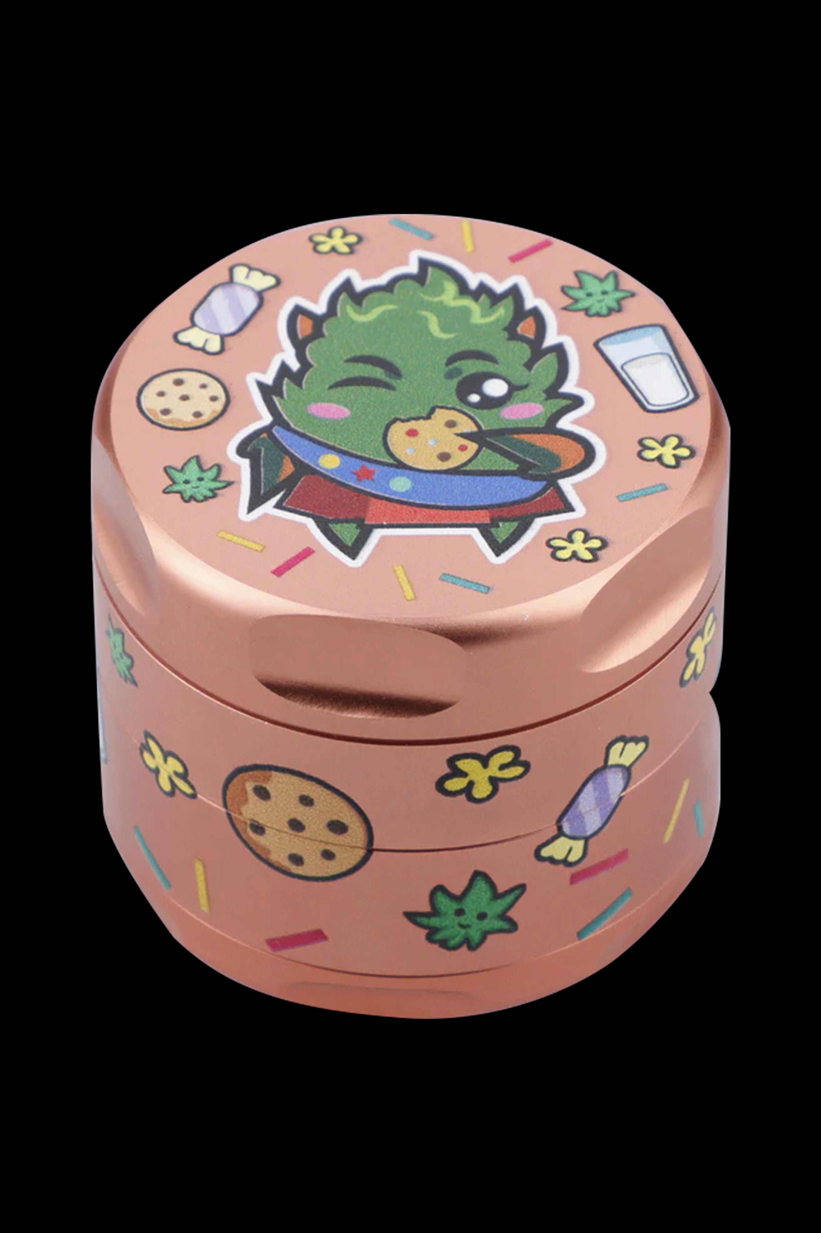 A cylindrical grinder decorated with a cartoon dinosaur enjoying cookies and milk, alongside cannabis leaves and candies.